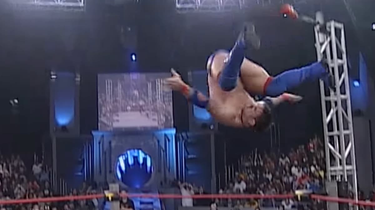 AJ Styles flipping through the air at Final Resolution 2005