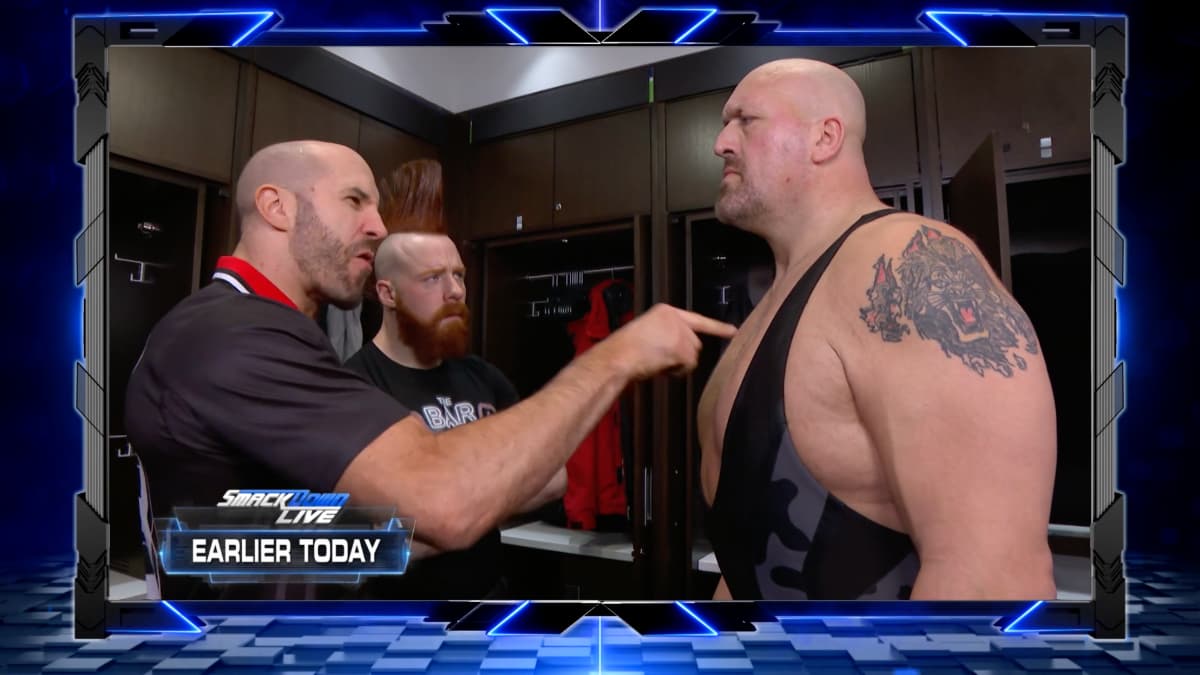 Cesaro prodding the Big Show's chest backstage on WWE SmackDown
