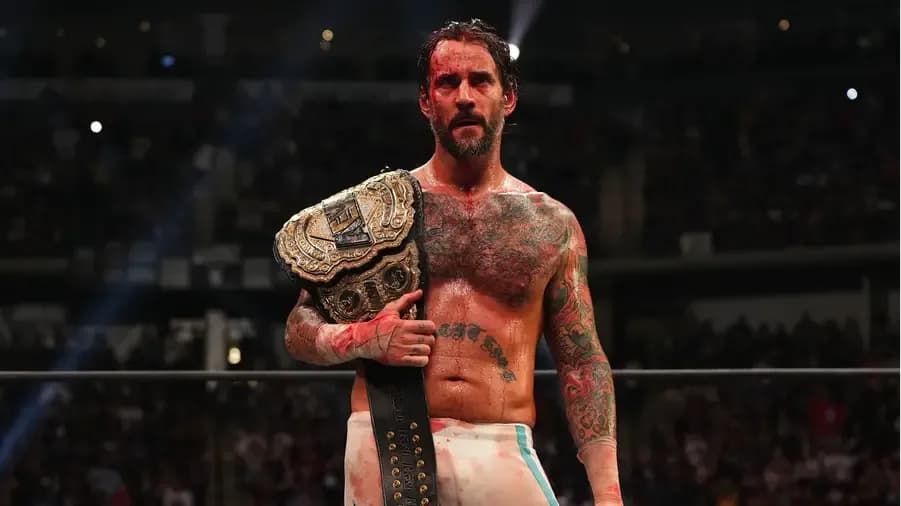 CM Punk All Out with world title.jpg