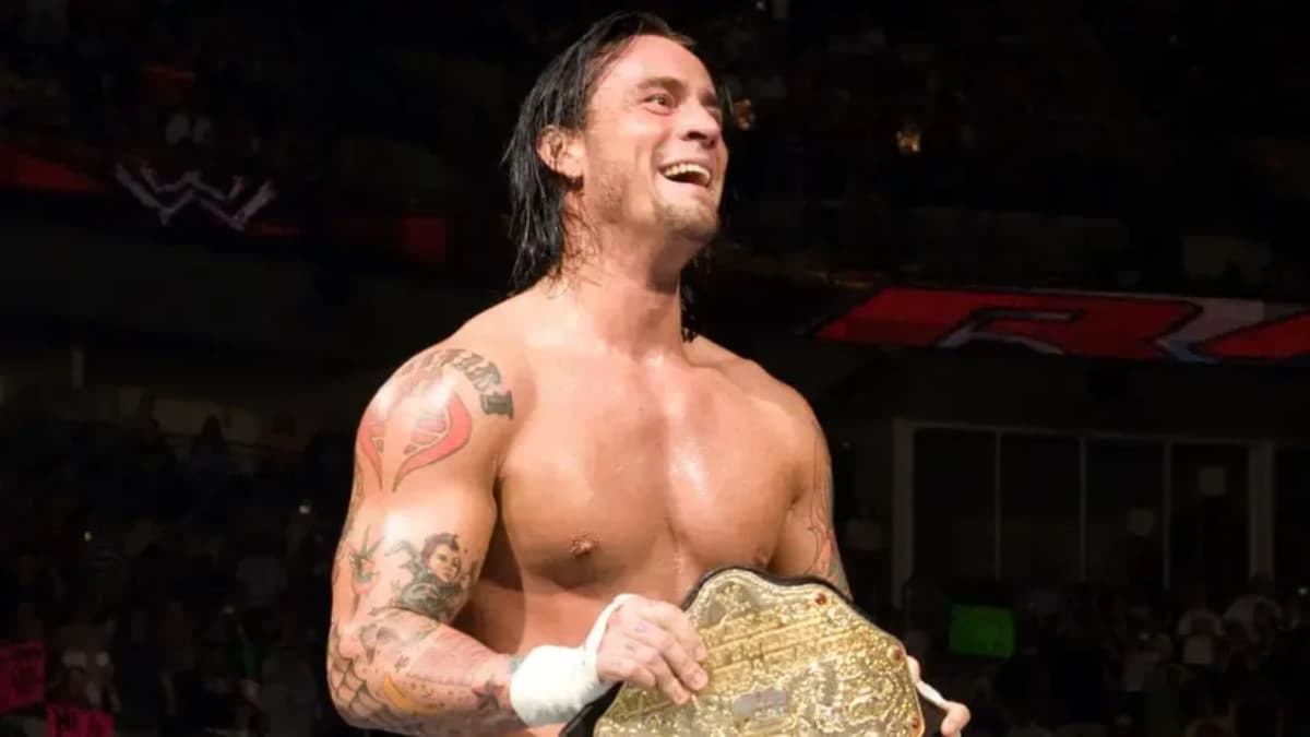 CM Punk with WWE World Heavyweight Title