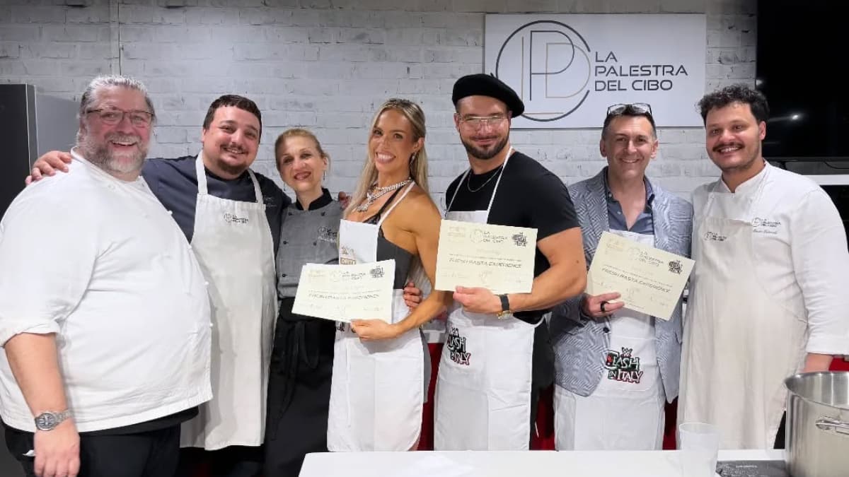 Maxxine Dupri, John Cone, and Ethan Page posing with pasta certificates at a past-making experience