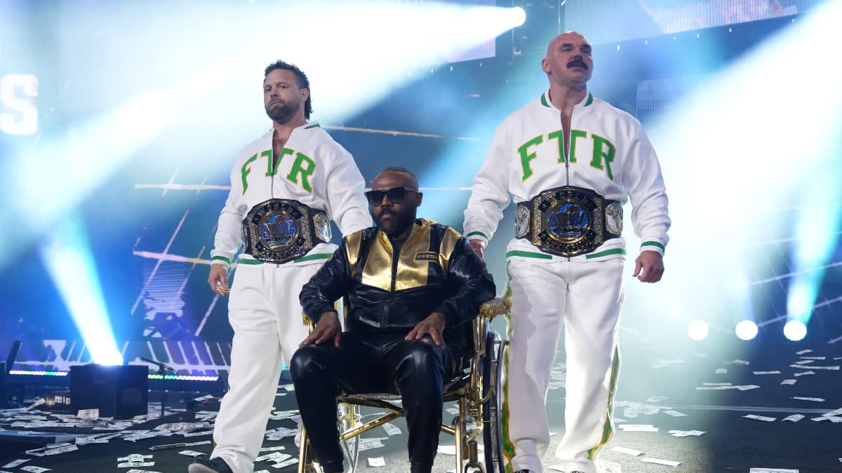 FTR in Boston Celtics-inspired tracksuits with Stokely Hathaway in a wheelchair at AEW Revolution 2026