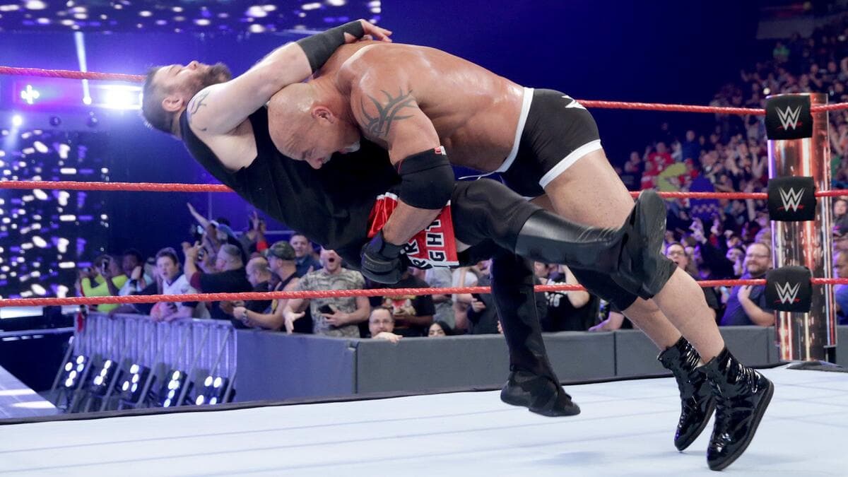 Goldberg spearing Kevin Owens at WWE Fastlane 2017