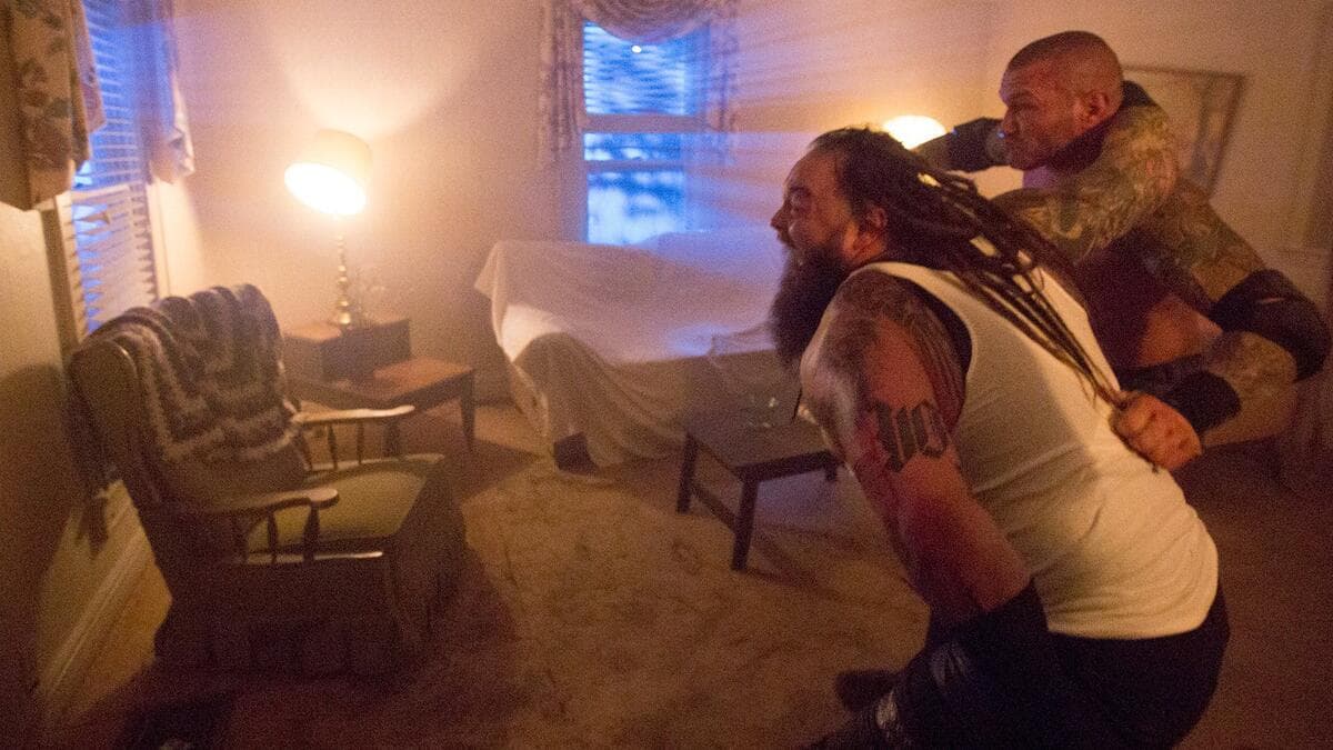 Randy Orton grabbing the back of Bray Wyatt's hair in House of Horrors match at WWE Payback 2017