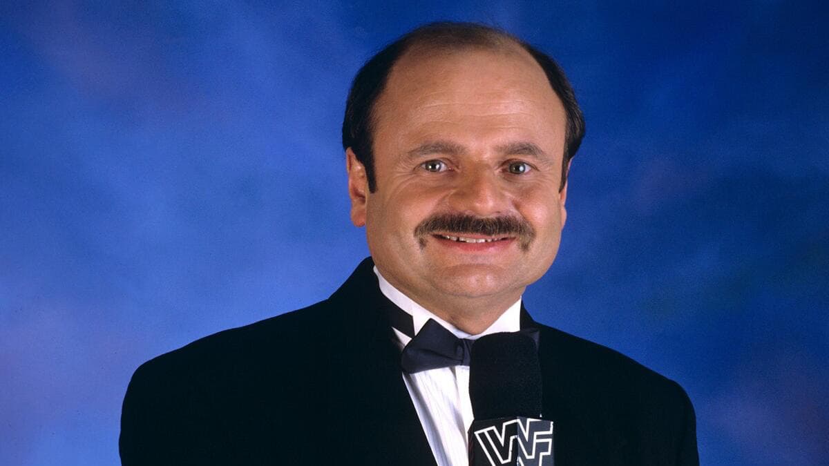 Howard Finkel smiling in a 1990s photoshoot