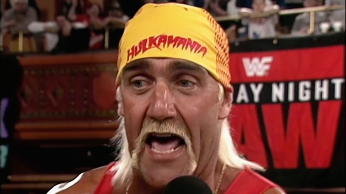 Hulk Hogan speaking into a microphone on WWE Raw in February 1993