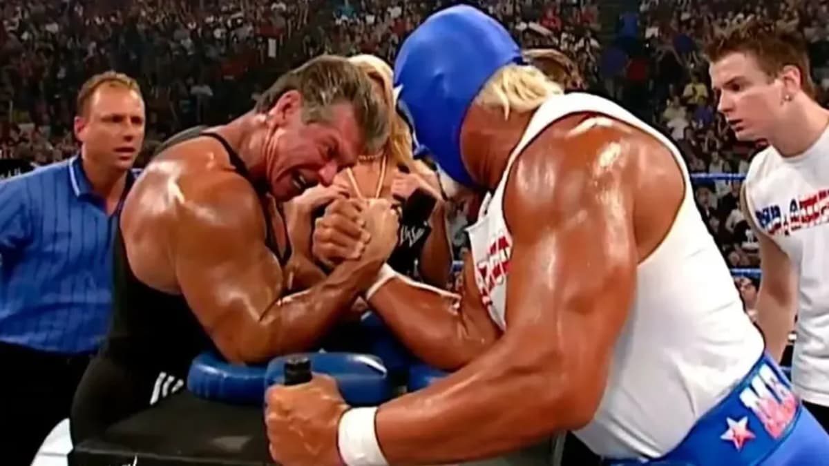 Vince McMahon and Mr America in an arm wrestling contest