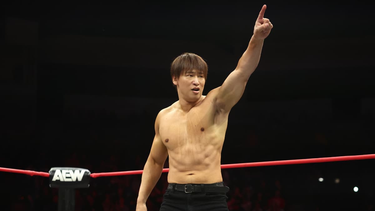 Kota Ibushi in an AEW ring points to the audience off camera