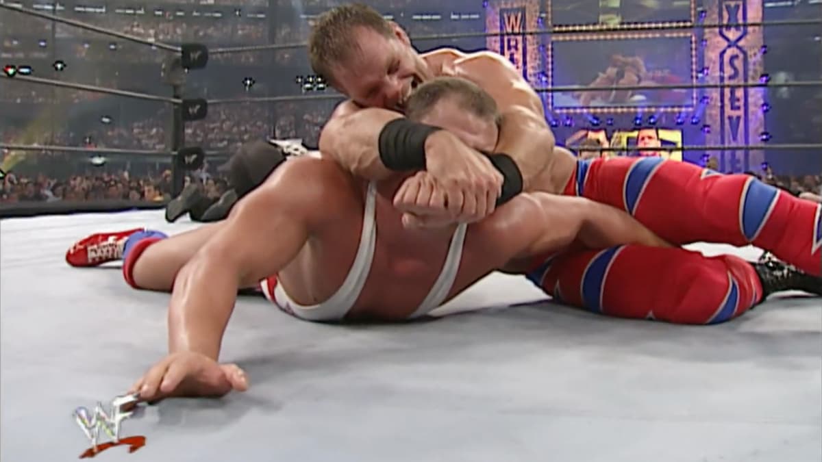 Chris Benoit with a Crossface on Kurt Angle at WWE WrestleMania X-Seven
