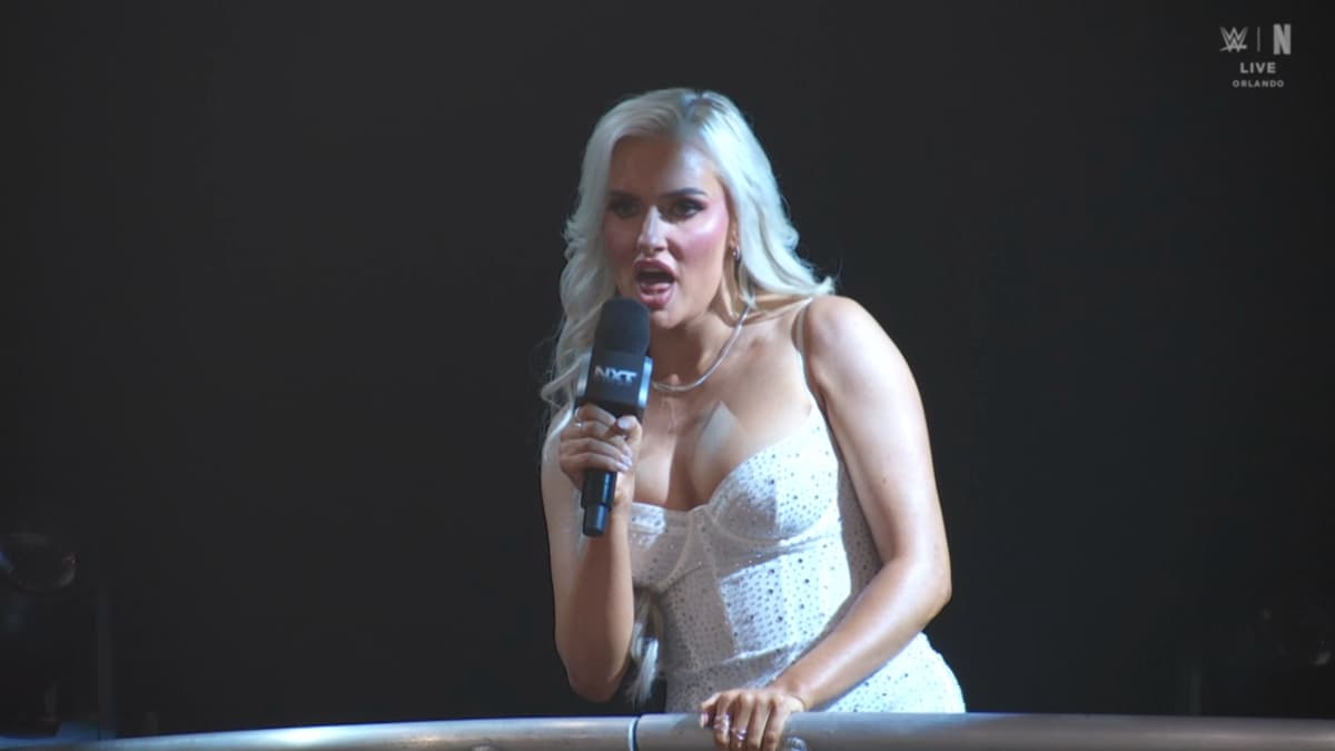 Mariah May looking out over the balcony during her WWE NXT debut