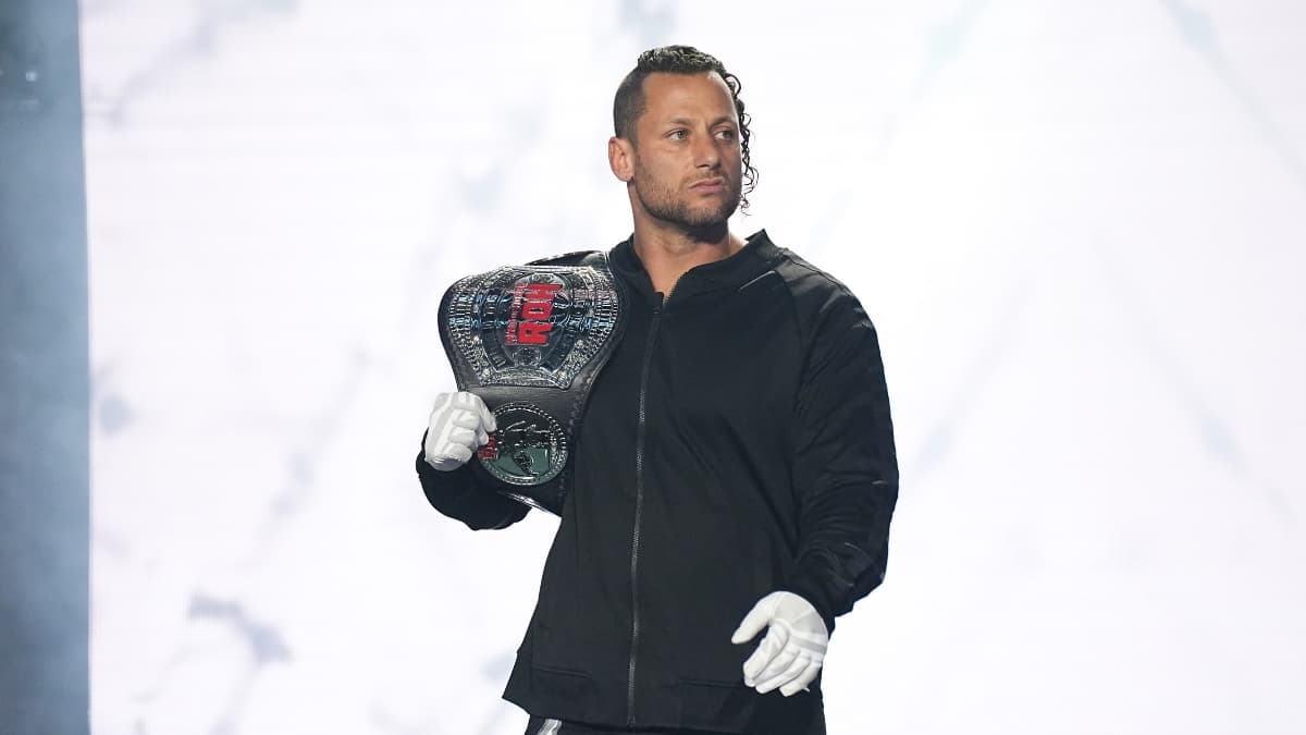 Matt Taven making his entrance holding the ROH World Tag Team Title