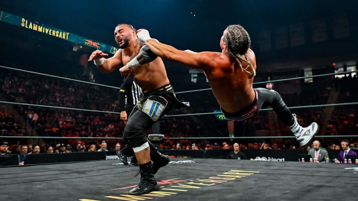 Mike Santana hitting a shoulder tackle to Nic Nemeth at TNA Slammiversary 2026