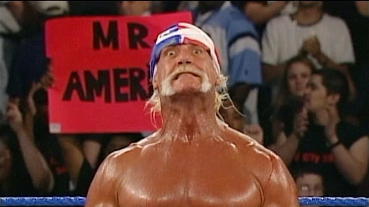 Hulk Hogan grinning after lifting up the Mr America mask