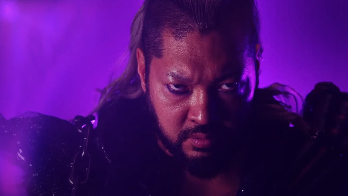 Close up of Naraku/EVIL with purple lightning behind him on WWE NXT