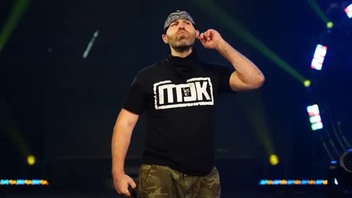 Nick Gage cupping his ear
