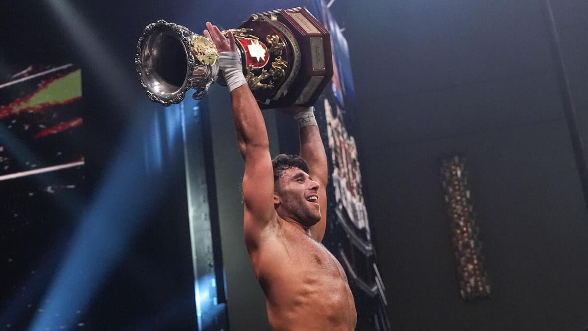 Noam Dar holding up the WWE NXT Heritage Cup