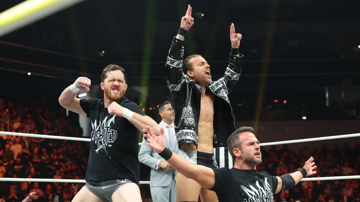 Kyle O'Reilly, Adam Cole and Roderick Strong posing on AEW Dynamite