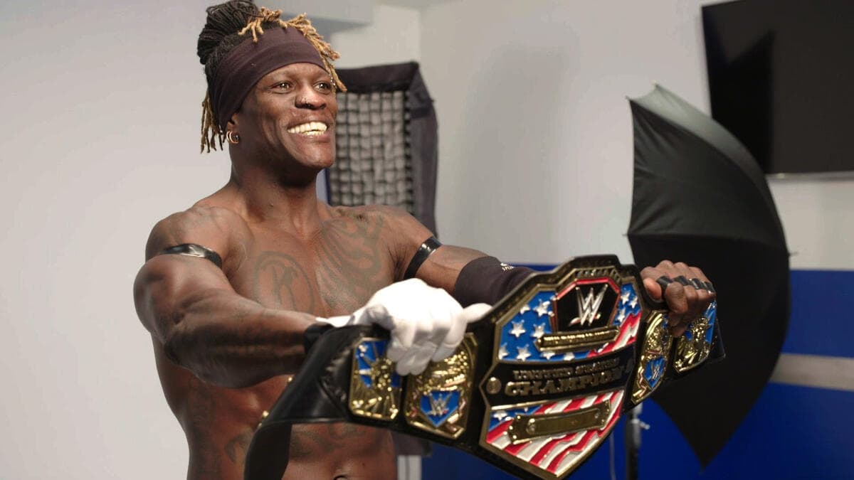 R-Truth posing with the WWE United States Title belt following his win in January 2019
