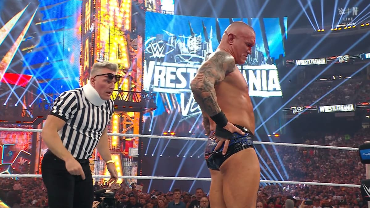 Pat McAfee standing behind Randy Orton at WWE WrestleMania 42