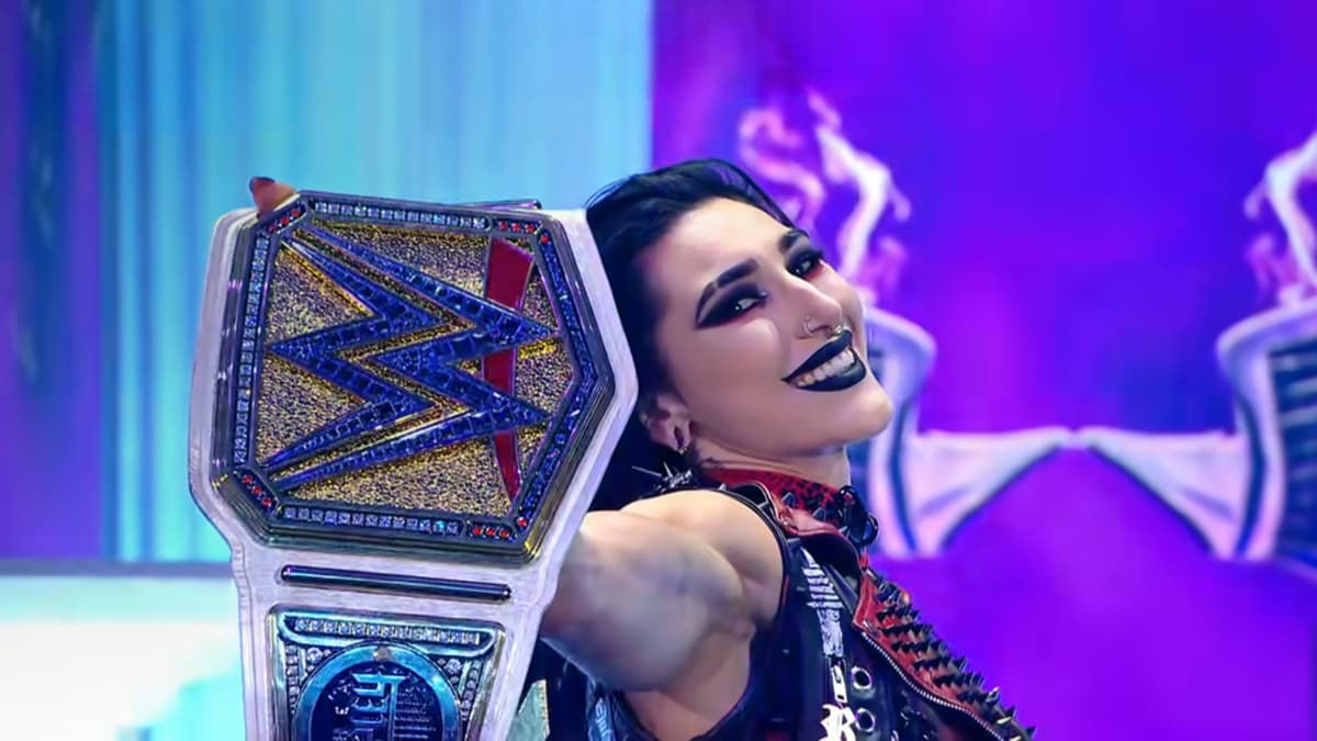 Rhea Ripley holding up the WWE Women's Title at Clash In Italy 2026
