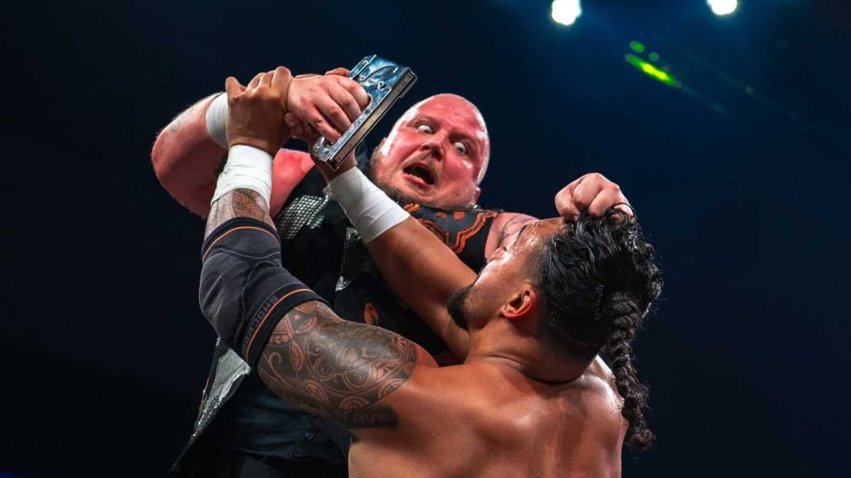 Sami Callihan trying to staple Mike Santana's head