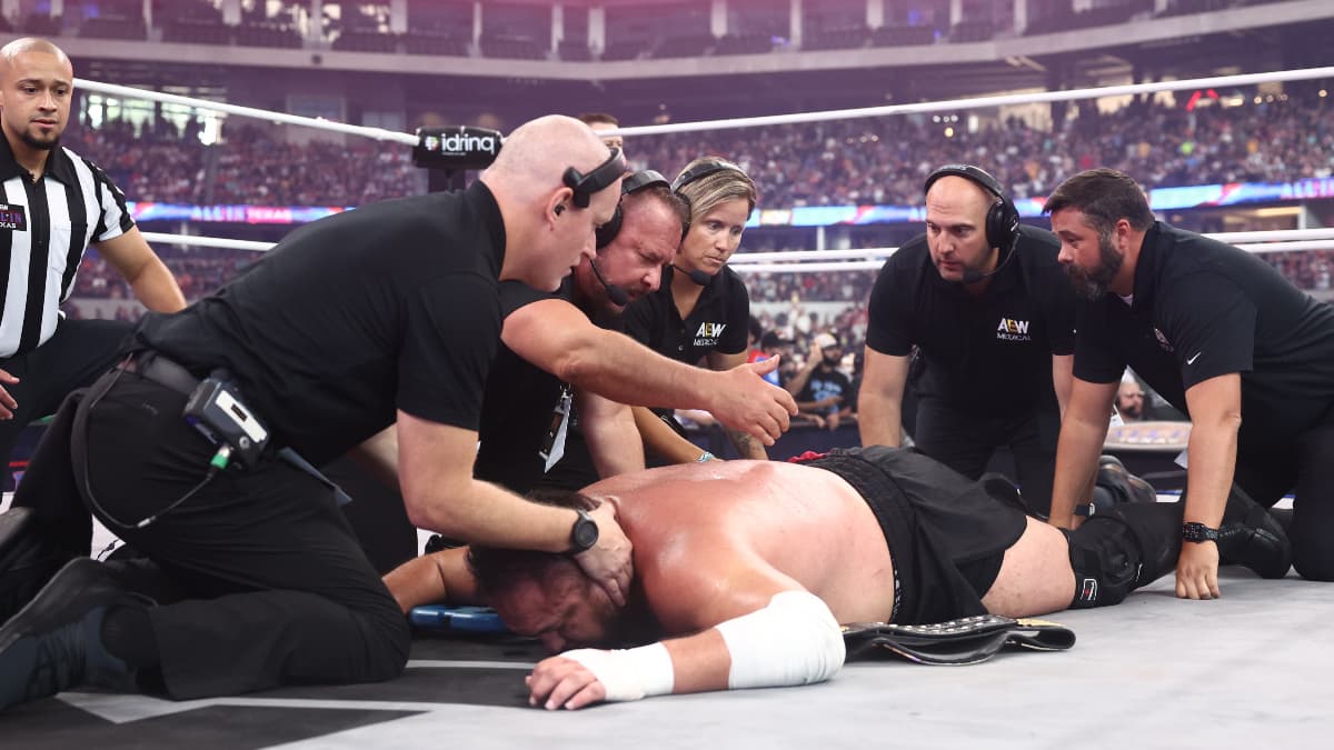 Samoa Joe attended to by medical staf at AEW All In Texas