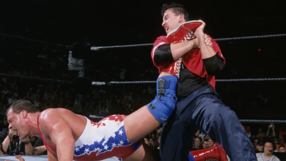 Shane McMahon with an ankle lock on Kurt Angle at WWE King of the Ring 2001