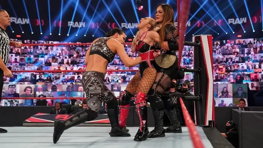 Shayna Baszler Nia Jax beat up Lana.jpg