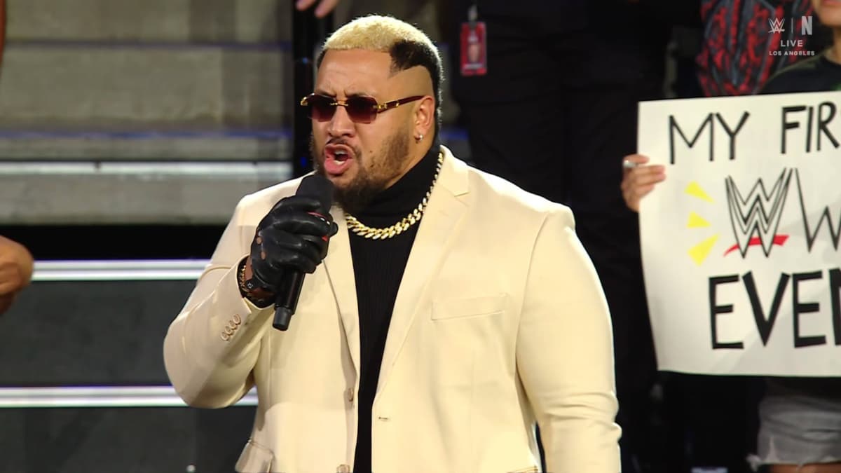 Solo Sikoa in a white suit on WWE Raw