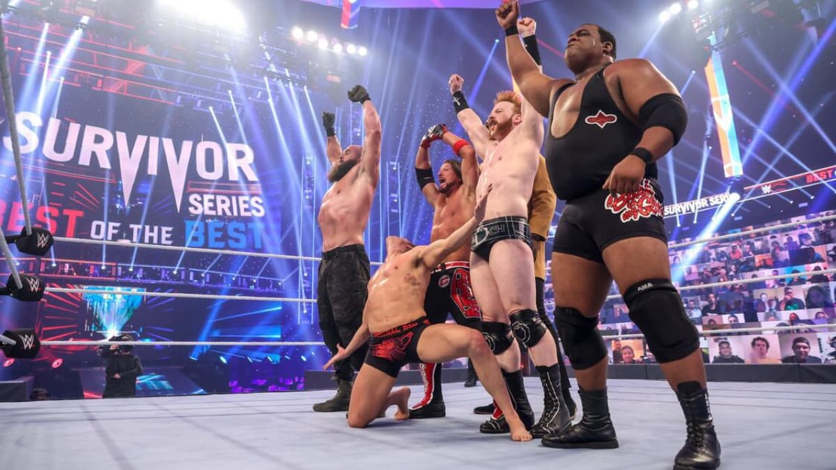 Team Raw celebrating at WWE Survivor Series 2020
