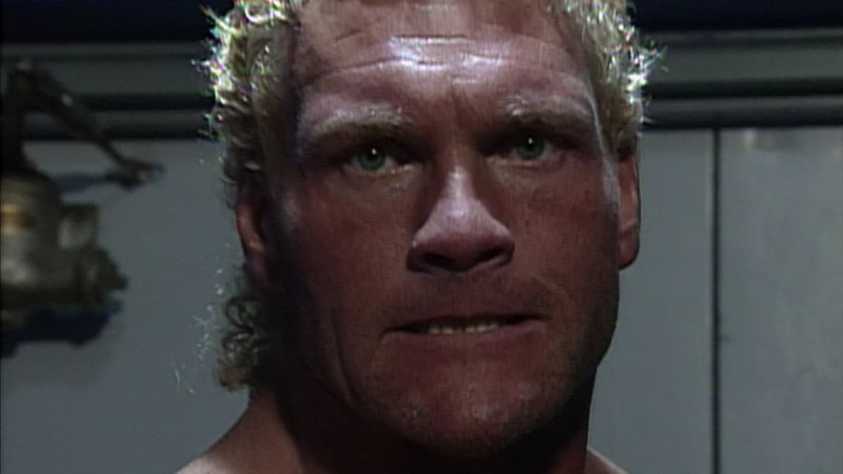 Sycho Sid waiting to cut his promo looking at the camera at WWE In Your House 14