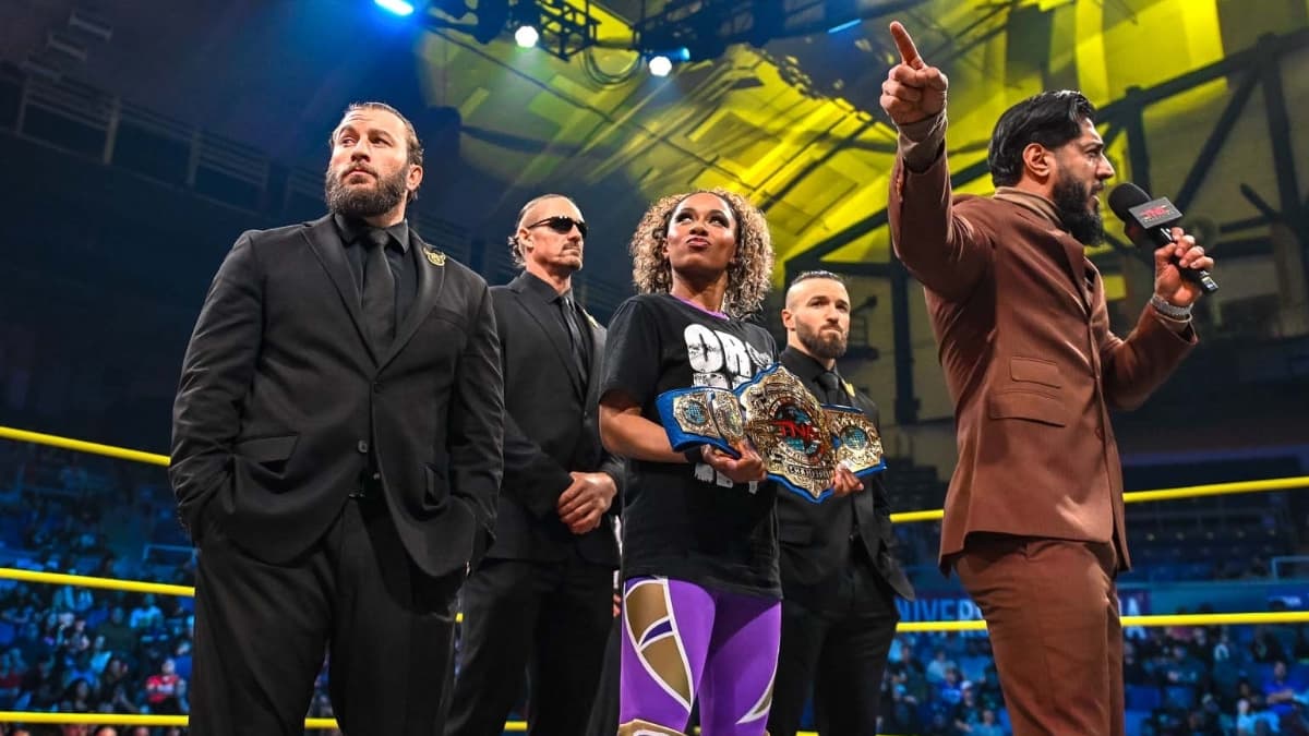 Tasha Steelz holding the TNA International Title as Order 4 cut a promo