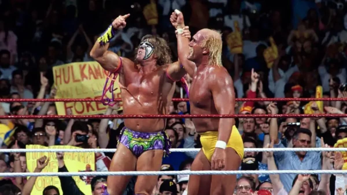 The Ultimate Warrior raising Hulk Hogan's arm at WWE WrestleMania VIII