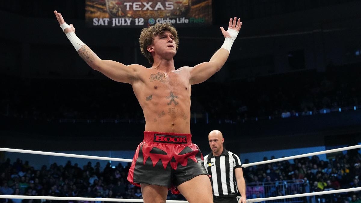HOOK posing in red and black shorts on April 2025 episode of AEW Dynamite