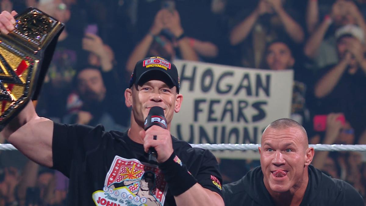 John Cena holding up the Undisputed WWE Title about to be hit with an RKO by Randy Orton