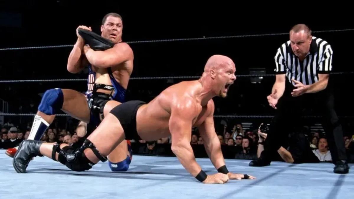 Kurt Angle with an ankle lock on Steve Austin at WWE SummerSlam 2001