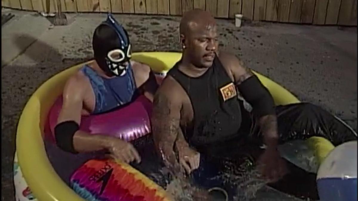 New Jack and Shark Boy sitting in a pool