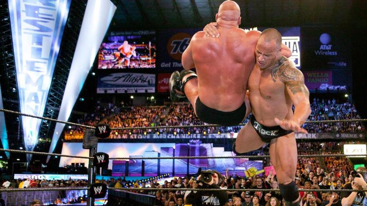 The Rock hitting a Rock Bottom to Steve Austin at WWE WrestleMania 19