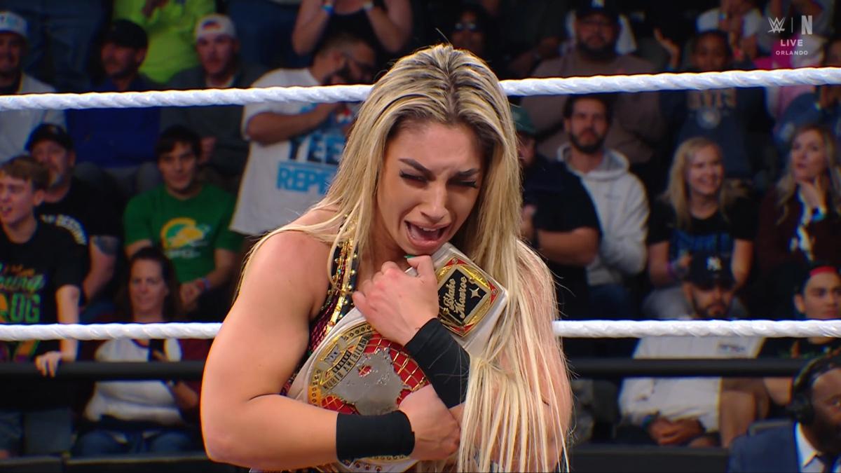 Thea Hail clutching the NXT Women's North American Title 