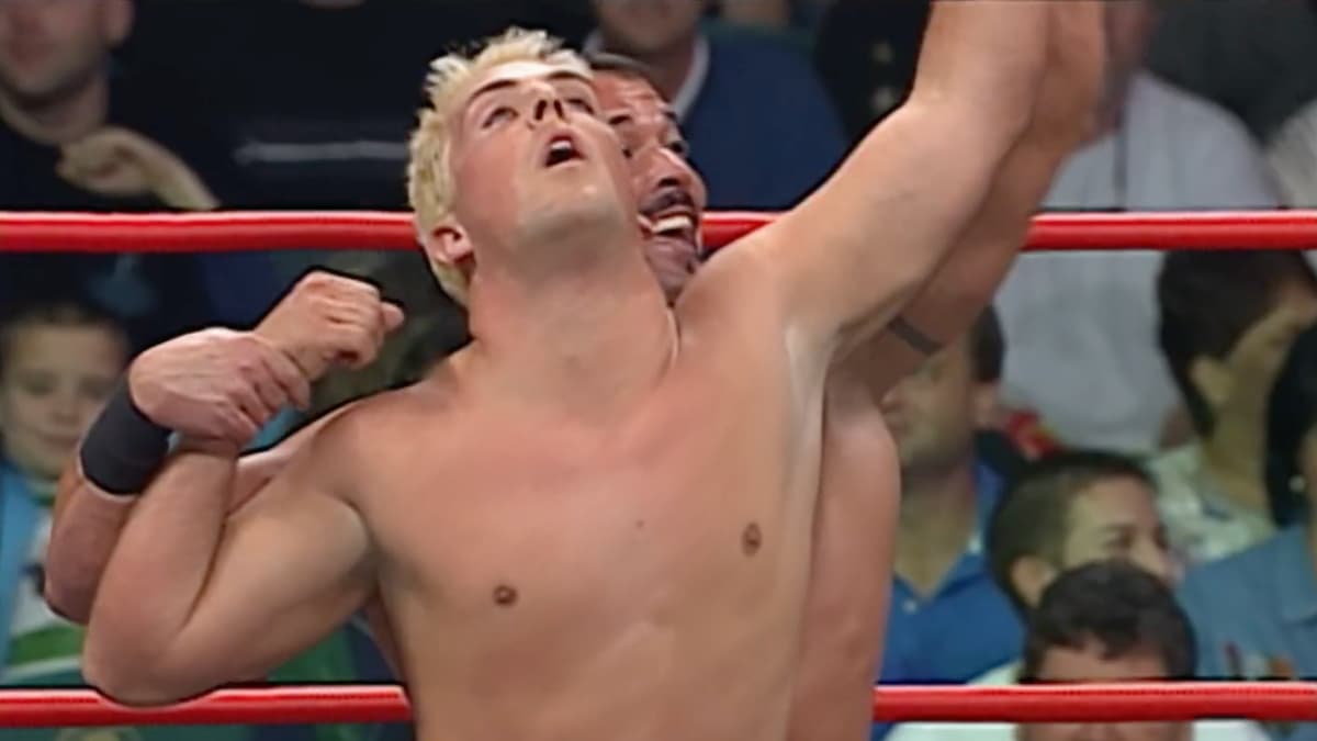 Buff Bagwell posing with a groggy David Flair at WCW Halloween Havoc 2000