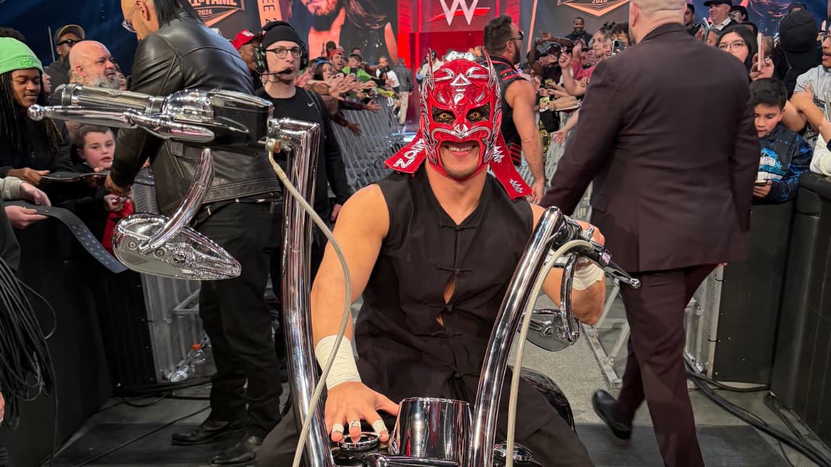 Dragon Lee with wild eyes sitting on a trike