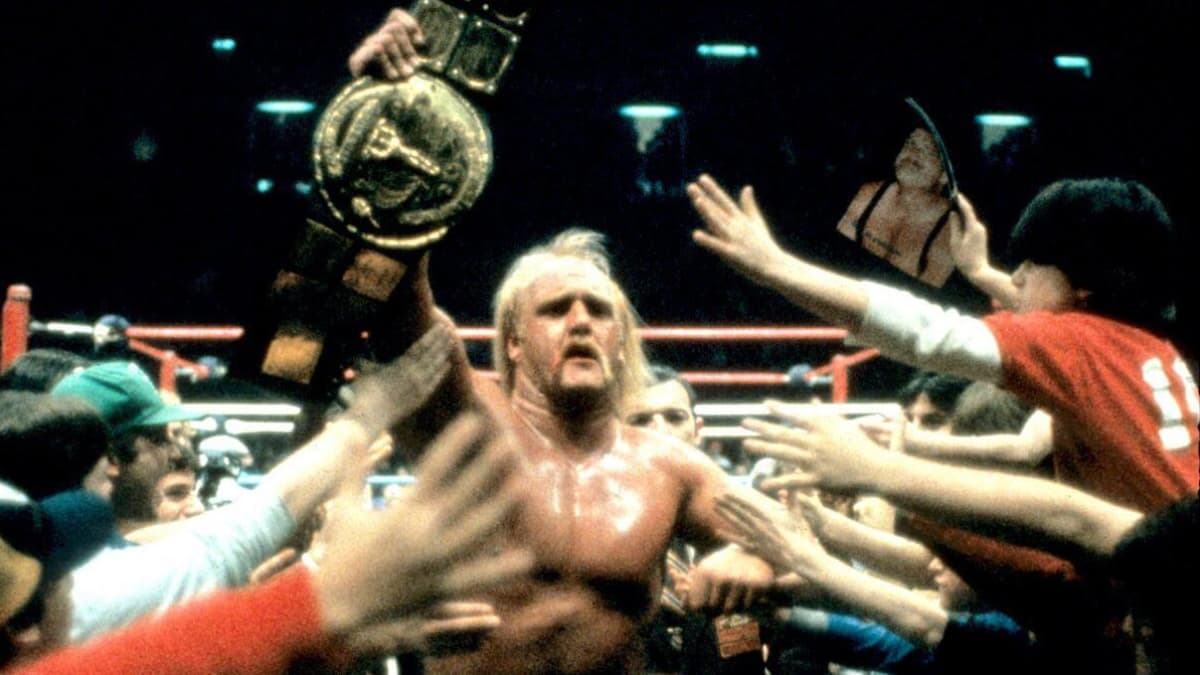 Hulk Hogan holding up the WWF Title after winning it for the first time in 1984