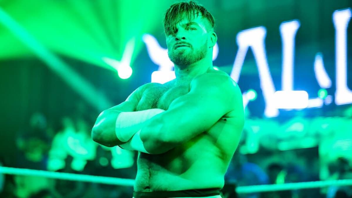 Joe Coffey posing with his arms crossed on WWE NXT
