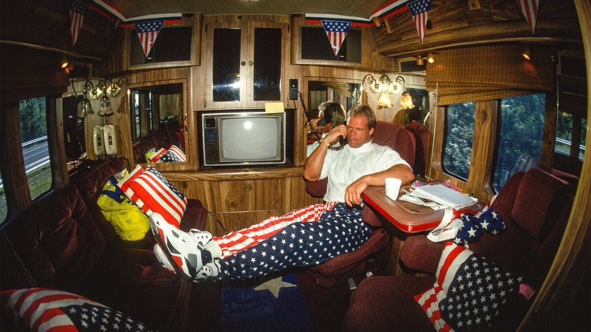 Lex Luger sitting inside the Lex Express answering a landline phone