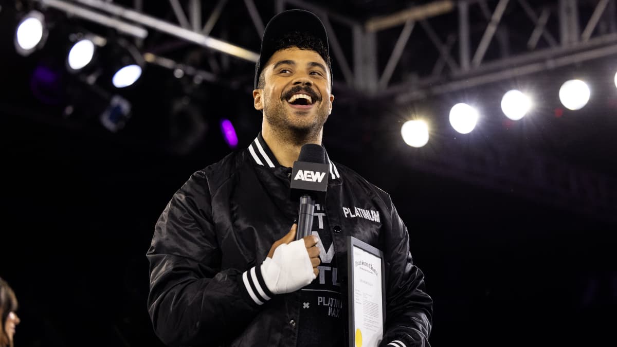 Max Caster cutting a promo while smiling on AEW Collision