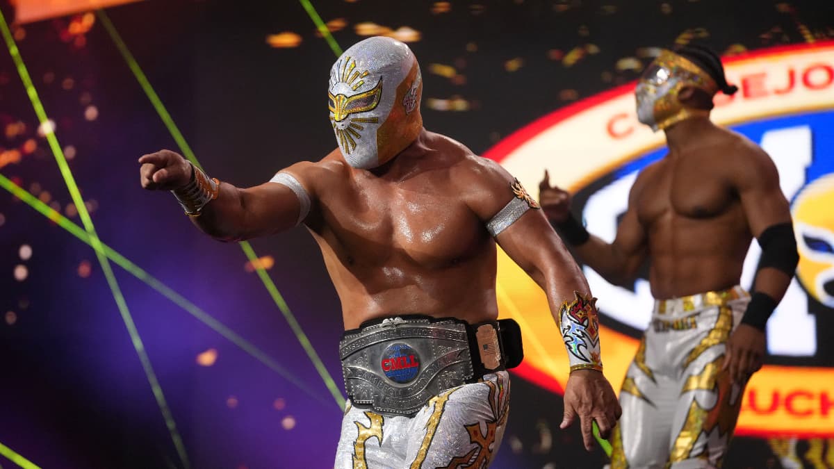 Mistico pointing at the ring while making his entrance at AEW Revolution 2026