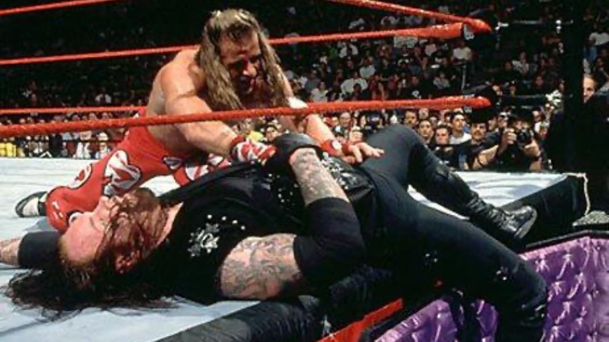 Shawn Michaels pushing The Undertaker at WWE Royal Rumble 1998