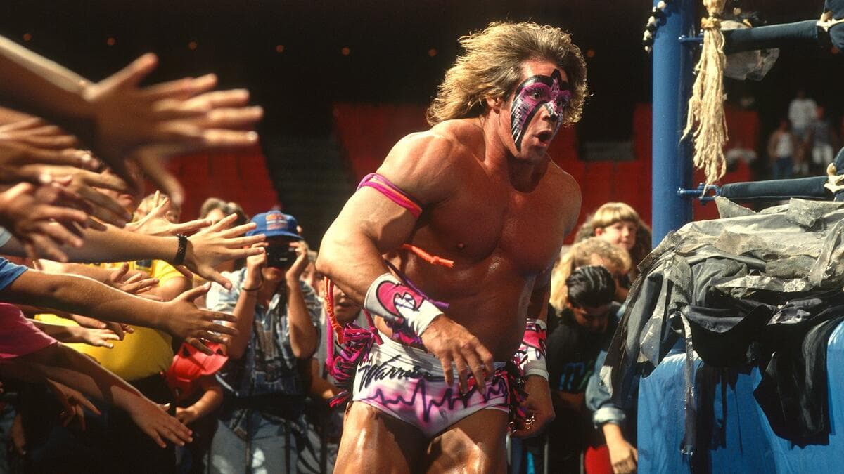 The Ultimate Warrior running around the ring