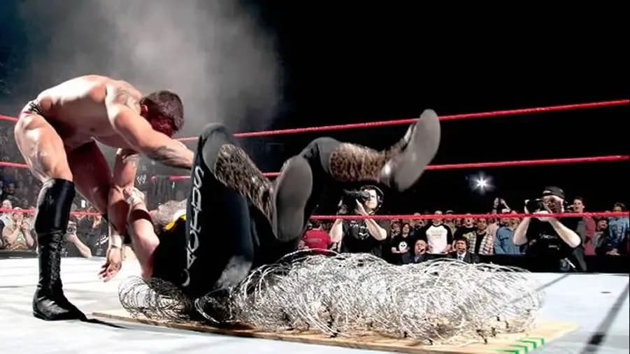 https://cultaholic.com/files/images/0f1b34207d76650d0442b47d6fa9c68cf9442f28-randy-orton-cactus-jack-backlash-2004.jpg