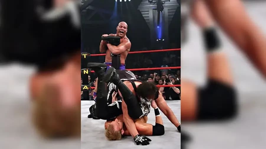 https://cultaholic.com/files/images/6b4e88e0463cbc2ce0b624885caf0cbd4c82c40c-kurt-angle-sting-christian.jpg
